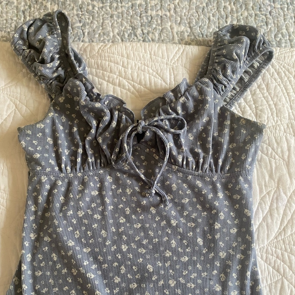 Blue dainty floral print ruffle bow body suit size XS